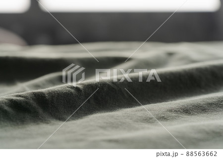 closeup shot of green premium cotton fabric closeup shot of green premium cotton fabric 88563662