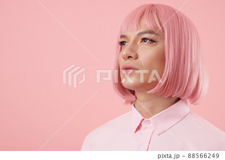 Man Wearing Pink Bob Wig Man Wearing Pink Bob Wig 88566249