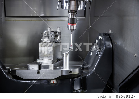 Metalworking CNC milling machine. Cutting metal modern processing technology. Metalworking CNC milling machine. Cutting metal modern processing technology. 88569127
