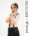 Studio photo of middle aged woman starting getting grey-haired wearing black and white clothes on white background, middle age sexy lady, happy life concept 88574780