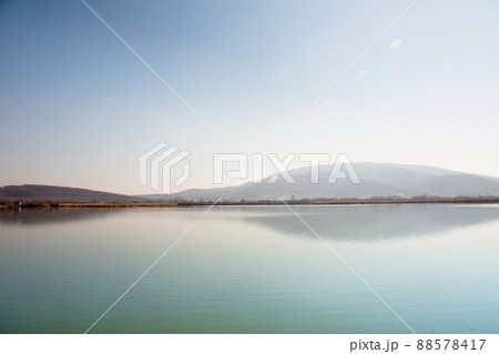 Big lake near the mountain in the morning 88578417