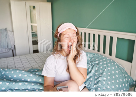 Morning sleepless yawn. Young pretty woman wake up at home. Bed time. Snooze 88579686
