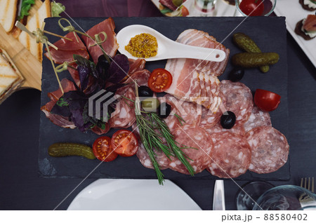 Different types of sausages served on wooden table Different types of sausages served on wooden table 88580402
