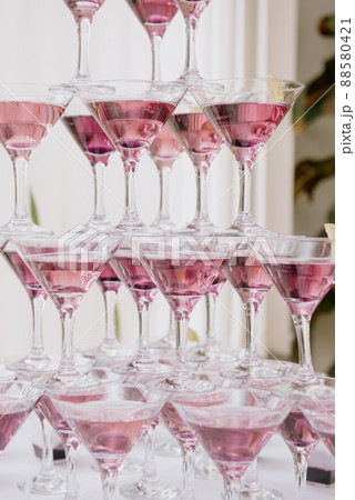 Pyramid of Champagne Glasses with Color Cocktails. Pyramid of Champagne Glasses with Color Cocktails. 88580421