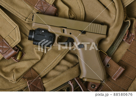 Weapons and military gun equipment for army with tactical flashlight, Semi-automatic handgun 88580676