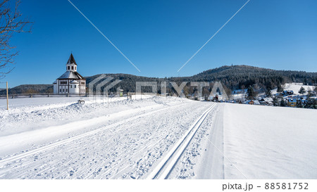 Wooden evangelic chapel in Tesarov in wintertime 88581752