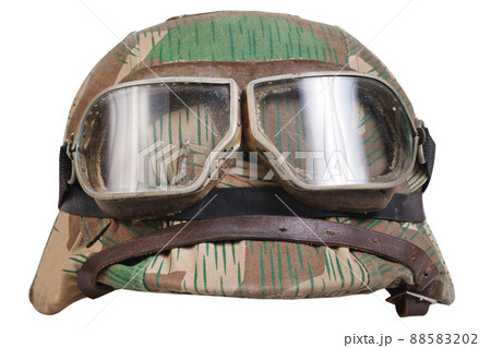 German nazi army helmet with with protective goggles and camouflage cover, type Splinter, helmet M35, M40, M42. German nazi army helmet with with protective goggles and camouflage cover, type Splinter, helmet M35, M40, M42. 88583202