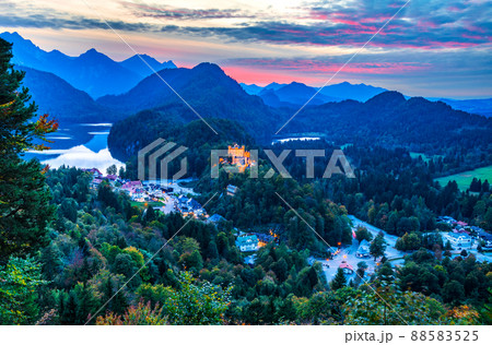 Hohenschwangau, Bavaria - Famous bavarian fairytale mountains landscape with Alpsee and Schloss Hohenschwangau 88583525