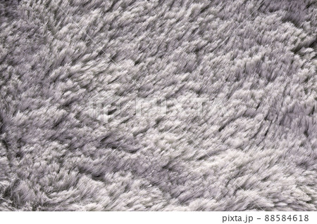 Artificial fur texture for background close-up. Fluffy grey material backdrop. Artificial fur texture for background close-up. Fluffy grey material backdrop. 88584618