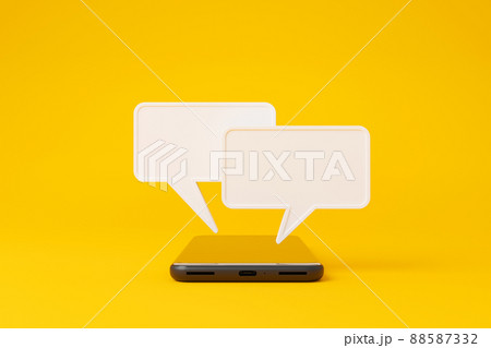 Mobile smartphone and speech bubble chat on yellow background 88587332
