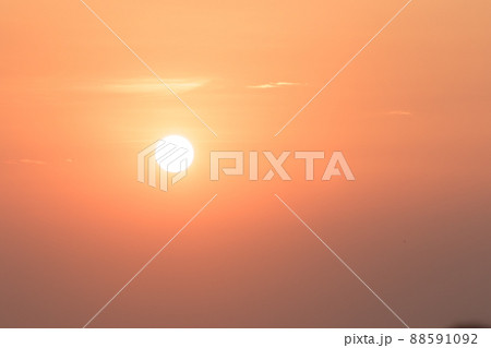 The landscape on a clear sky day will see a beautiful sunset slowly sliding down above the sea surface. It's a beautiful sight to see. The landscape on a clear sky day will see a beautiful sunset slowly sliding down above the sea surface. It's a beautiful sight to see. 88591092