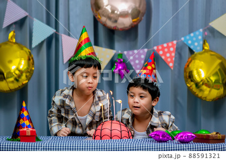 Twins adorable boy in shirt, celebrating his birthday,  88591321