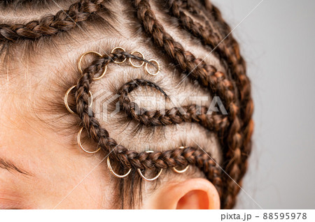 Close-up of braids on the head of a caucasian woman. 88595978