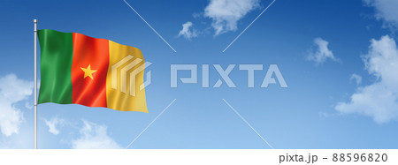 Cameroon flag isolated on a blue sky. Horizontal banner 88596820
