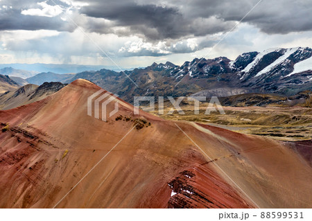Aerial view of the Red Valley near the Vinicunca Rainbow Mountain in the Andes of Peru Aerial view of the Red Valley near the Vinicunca Rainbow Mountain in the Andes of Peru 88599531