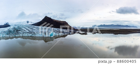 Glacier lake panoramic view with massive glaciar tongue 88600405