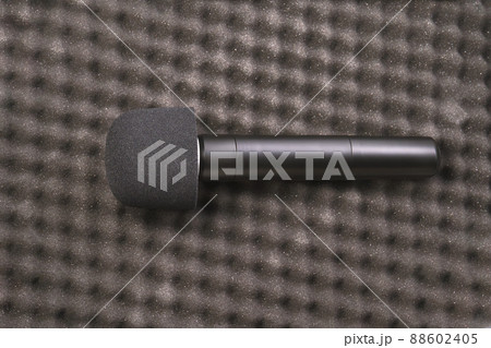 Podcast concept. Black microphone recorder, content notebook keypad Podcast concept. Black microphone recorder, content notebook keypad 88602405