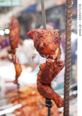 close up of slice of grill chicken display for sale  88607138