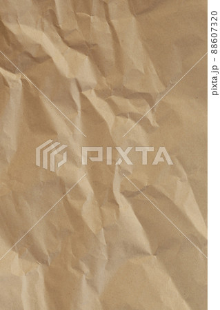 Light brown craft crumpled paper background closeup 88607320
