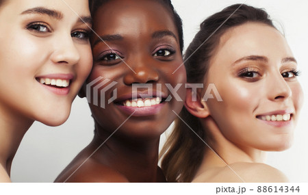 three different nation woman: african-american, caucasian together isolated on white background happy smiling, diverse type on skin, lifestyle real people concept three different nation woman: african-american, caucasian together isolated on white background happy smiling, diverse type on skin, lifestyle real people concept 88614344