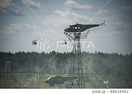Helicopters with troops are approaching the landing point. 88616462