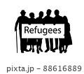 Silhouette family holds placard Refugees. 88616889