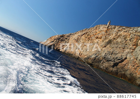 A lighthouse on the Greek sea A lighthouse on the Greek sea 88617745