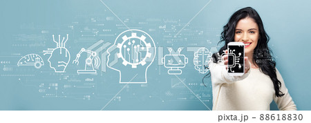 Future technology concept with woman holding a smartphone Future technology concept with woman holding a smartphone 88618830