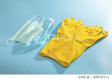 Protection against coronavirus, disposable surgical mask and reusable medical respirator for respiratory protection and sanitizer gel for hands, latex gloves. 88626511