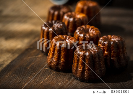 Canelé. Traditional French sweet dessert. Canelé. Traditional French sweet dessert. 88631805