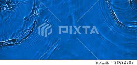 transparent dark blue colored clear calm water surface texture  88632585