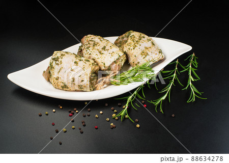 Raw meat for cooking. Fast cooking.Raw marinated chicken thigh in a light herb sauce. Fresh marinated BBQ chicken. 88634278