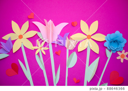 Paper art, bright summer holiday handmade flowers, craft on a pink background.. Colorful postcard for Mother's Day, Easter Paper art, bright summer holiday handmade flowers, craft on a pink background.. Colorful postcard for Mother's Day, Easter 88646366