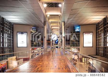 Kastrup international  Airport main hall with large round clock. Copenhagen, Denmark 88648582