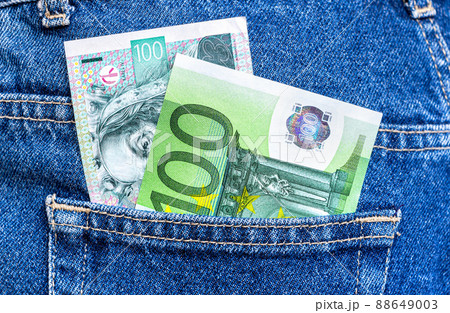 Banknotes of Czech krona and Euro in jeans pocket Banknotes of Czech krona and Euro in jeans pocket 88649003
