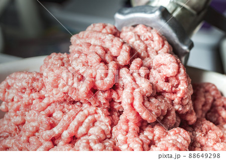 fresh minced meat from a meat grinder fresh minced meat from a meat grinder 88649298