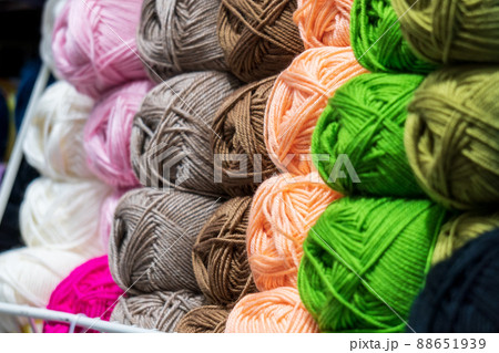 Close up gray yarn threads spool bobbin tubes. Sale of goods for hand made 88651939