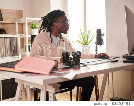 Graphic designer/photographer working in home office 88652491