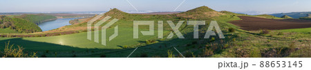 Amazing spring view on the Dnister River Canyon with picturesque rocks, fields, flowers. This place named Shyshkovi Gorby,  Nahoriany, Chernivtsi region, Ukraine. 88653145