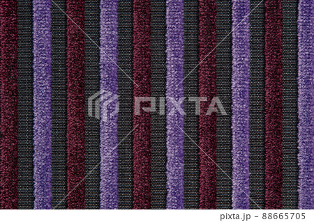 Corduroy background with lines pattern close up. Texture of violet corduroy textile - useful as background. Canvas vertical line texture. 88665705