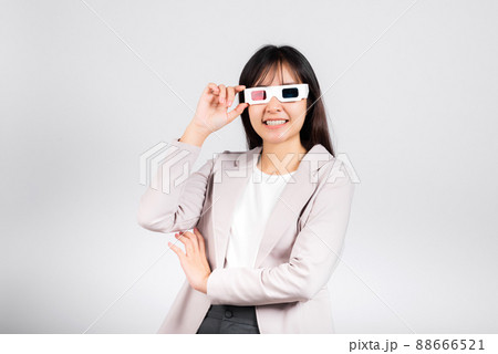 Smiling woman confidence wearing 3d cinema movie glasses Smiling woman confidence wearing 3d cinema movie glasses 88666521