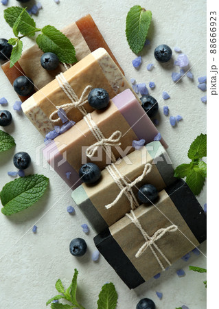 Different natural soap for skin care on white textured table Different natural soap for skin care on white textured table 88666923