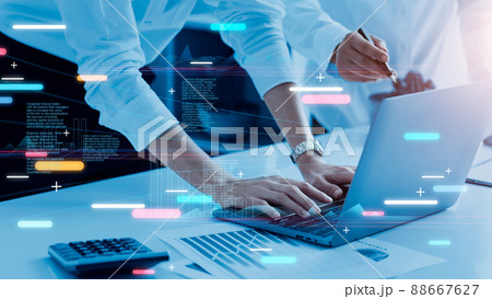 Businessman working on marketing plan together and using laptop analyzing data of growth graph financial and investment for success, Teamwork, Business strategy and planning, Blue tone. 88667627