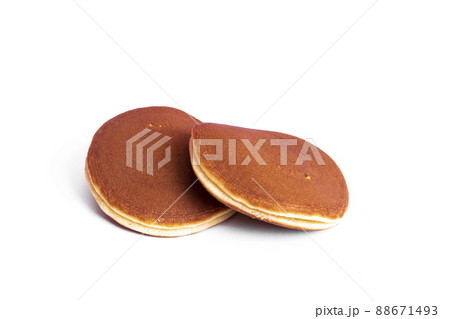 Two pancakes isolated on a white background Two pancakes isolated on a white background 88671493