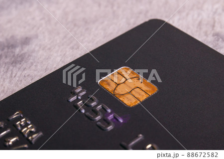 Bank card on a gray background closeup Bank card on a gray background closeup 88672582