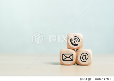 blank wooden cubes square dice with symbol email telephone address placed on wood background. 88673701