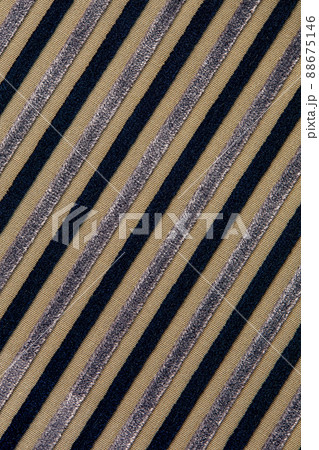 Background texture of velvet. Striped fabric texture background in gray and black color. Material with small stripes. Velveteen Background texture of velvet. Striped fabric texture background in gray and black color. Material with small stripes. Velveteen 88675146