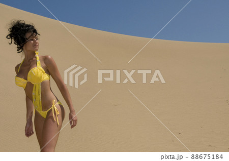 Beautiful woman with swimwear under the sun 88675184