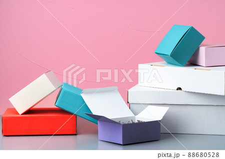 Set of cardboard boxes on pink background 88680528