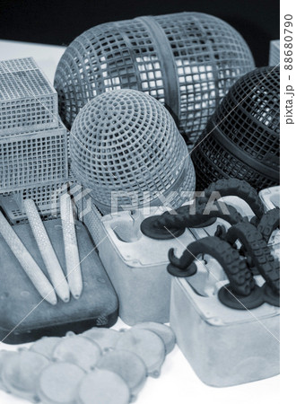 Many different objects printed on 3D printer from powder polyamide. Many different objects printed on 3D printer from powder polyamide. 88680790